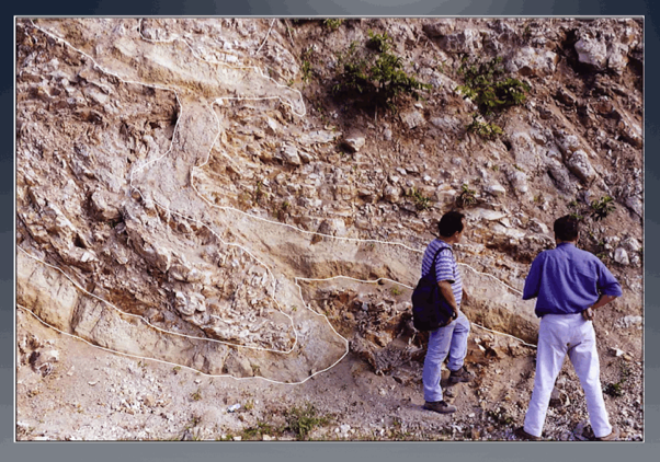 Close up of the mountain side showing sections of exposed spherule layers